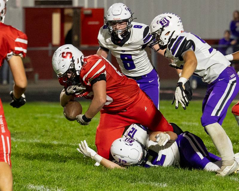 Aiden Ferris (63) of Streator fumbles ball during run on Friday, October 17, 2025 at Streator High School in Streator.