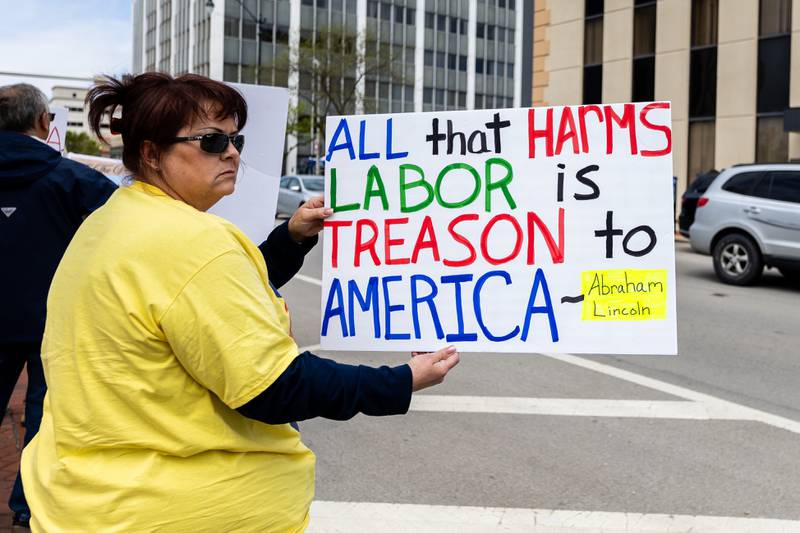 Janette Steinhilber, a member of Teamsters Local 179, supports strong unions during the May Day Weekend Rally in Downtown Joliet on May 3, 2025.