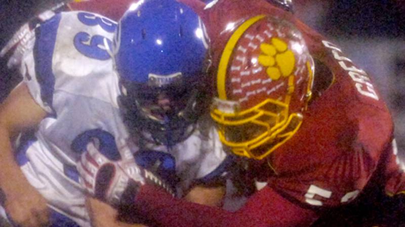 Batavia’s Mike Greco (right) attempts to take down Geneva’s Connor Quinn during Friday night’s game at Batavia. Sandy Bressner – sbressner@kcchronicle.com