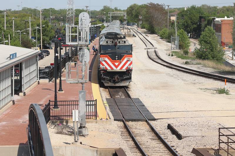 A Metra train waits to depart at the Joliet Gateway Center station on Thursday, May 11, 2023 in Joliet.