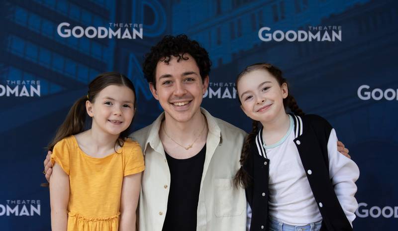 Tommy is played at age 4 by Ava Rose Doty (left) of Downers Grove and Presley Rose Jones (right) of Chicago, flanking the adult Tommy, portrayed by Ali Louis Bourzgui.