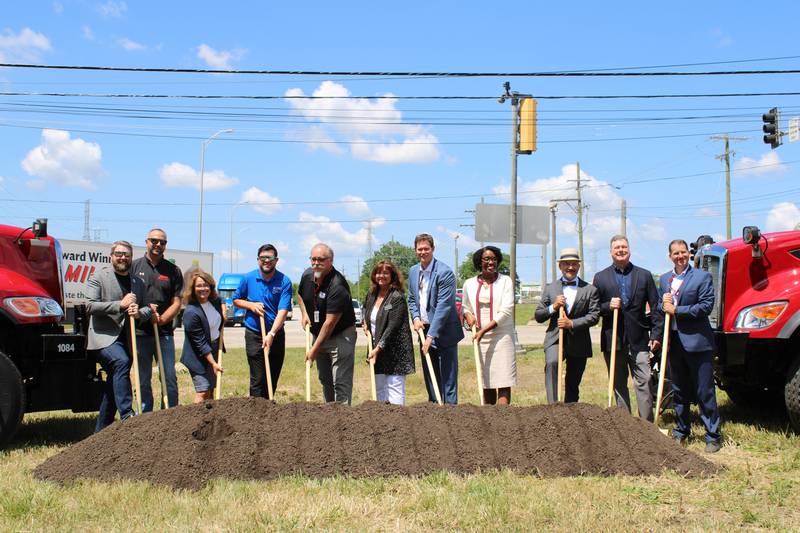 Officials break ground for the 143rd Street East Extension. From left to right: Representative Harry Benton; Andy Moore - D Construction; State Senator Meg Loughran Cappel; Tice Cole – Crawford, Murphy & Tilly, Inc; Randy Jessen, Plainfield Superintendent of Public Improvements; Plainfield Trustee Margie Bonuchi; IDOT Deputy Secretary Jeremy LaMarche; Representative Lauren Underwood; Plainfield Village President John Argoudelis; Plainfield Trustee Richard Kiefer; and Scott Threewitt, Plainfield Director of Public Works.