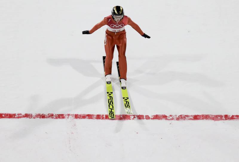 Kevin Bickner, of the United States, lands during men's large hill Individual ski jumping competition at the 2018 Winter Olympics in Pyeongchang, South Korea, Saturday, Feb. 17, 2018.