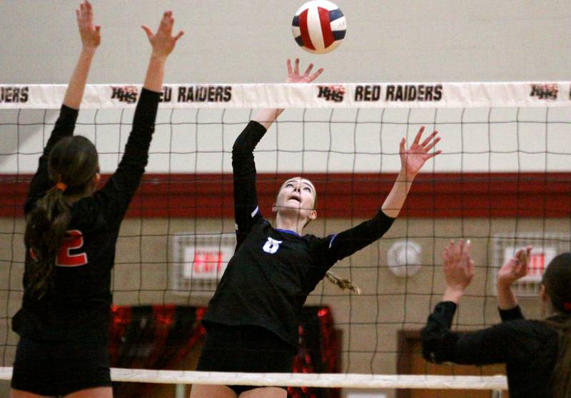 Burlington Central’s Ainsley Wilson plays the ball in varsity volleyball at Huntley High School in Huntley on Thursday, Oct. 24, 2024.