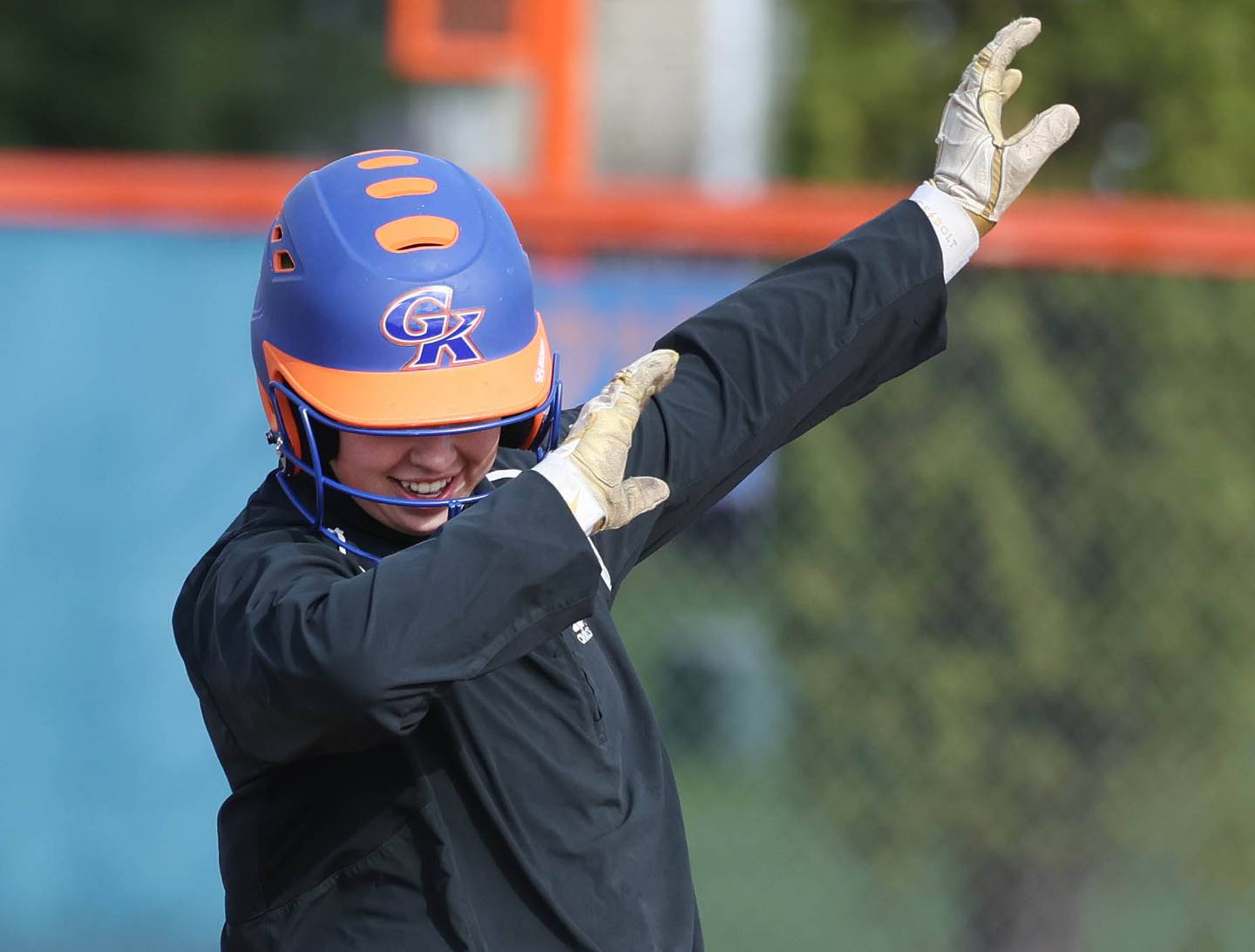 Genoa-Kingston’s Elizabeth Davis pulls off a little dab as she arrives safely at second base during their game against Winnebago Monday, April 21, 2025, at Genoa-Kingston High School.