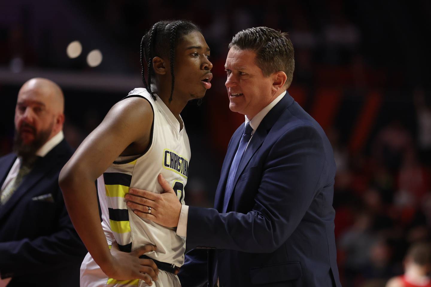 Yorkville Christian head coach Aaron Sovern talks with K.J. Vasser during a break against Liberty in the Class 1A championship game at State Farm Center in Champaign. Friday, Mar. 11, 2022, in Champaign.