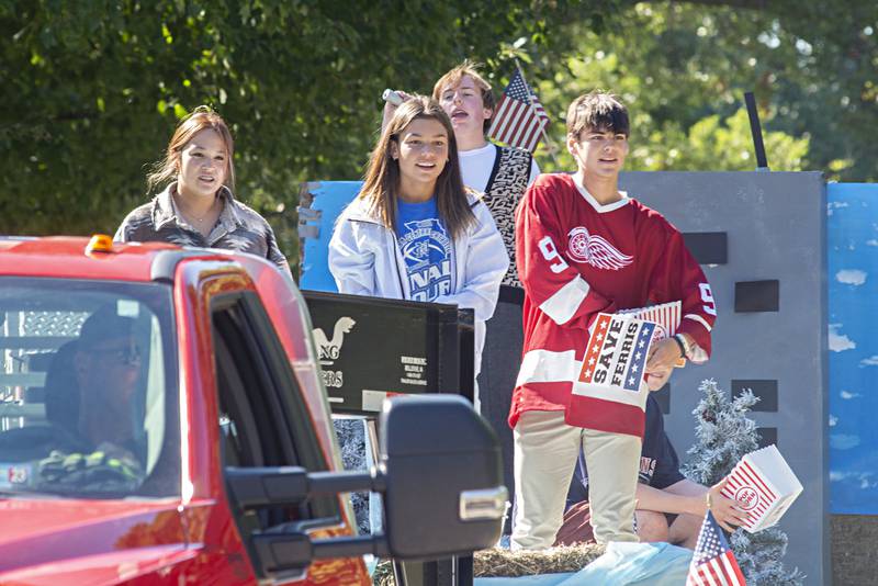 The Newman High School class of 2024 shows off on their Ferris Bueller float during the school’s homecoming parade Friday, Sept. 30, 2022.