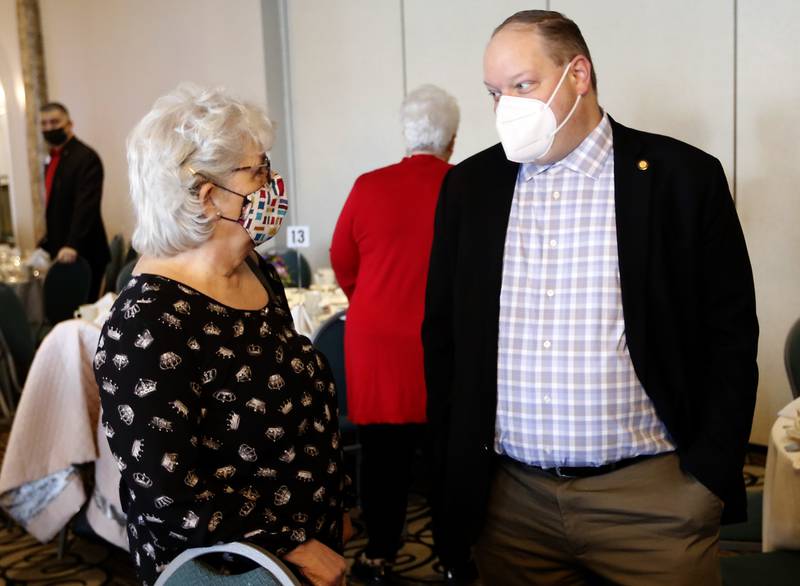 Diana Kenneym the Executive Director at Downtown Crystal Lake, talks with Crystal Lake City Clerk: Nick Kachiroubas during the Crystal Lake Chamber of Commerce’s State of the Community Luncheon, Friday, Feb. 4, 2022,  at D'Andrea Banquets & Conference Center. The annual luncheon feature guest speakers Crystal Lake Mayor Haig Haleblian and Village of Lakewood President David Stavropoulos who spoke about their respective communities.