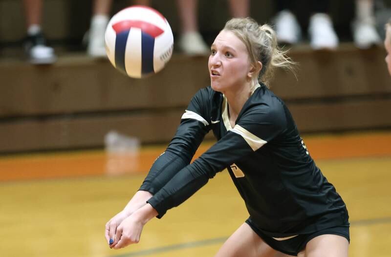 Sycamore's Chloe Schuld bumps the ball during their match against Genoa-Kingston  Monday, Aug. 29, 2022, at Genoa-Kingston Middle School in Genoa.
