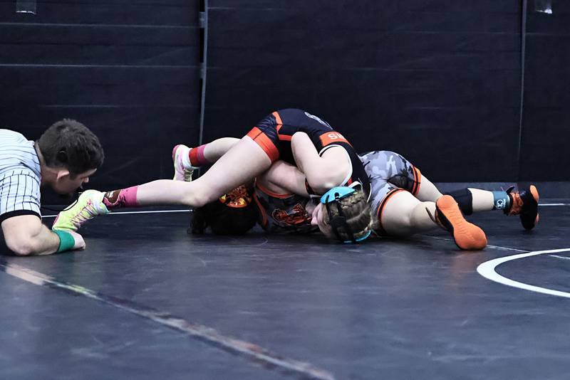 EP freshman wrestler Roz Mosher positioning herself to pin Kewanee's Hailey Lampe on Saturday, Jan. 10, 2026, during the first annual EP Girls Wrestling Invite held at Erie High School. Mosher pinned her way to the 2nd place spot on the podium in the 110 pound weight class