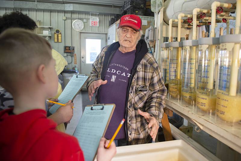 Volunteer Len Masella leads one of the fifth grade groups through the process. In all 47 students attended the field trip.