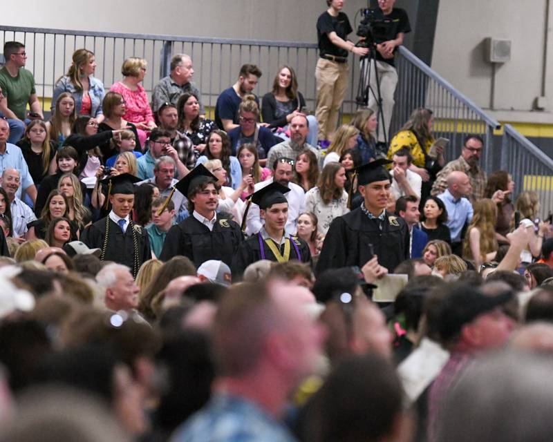 Sycamore High School seniors make their way to their seats on Sunday, May 25, 2025, at the high school for the start of the Class of 2025 Commencement ceremony.
