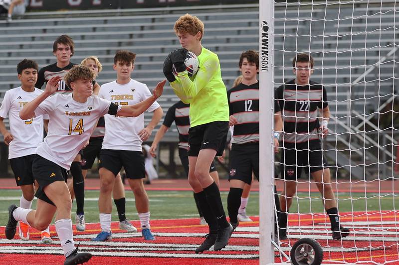 Lincoln-Way Central’s Jimmy McKendry intercepts the corner kick by Joliet West in the Class 3A Lincoln-Way Central Regional semifinal on Tuesday, Oct. 22, 2024 in New Lenox.