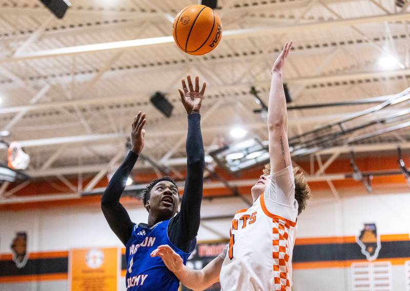 Marmion Academy guard David Malley shoots a free throw during a game against St. Charles East High School on Saturday, Jan. 4, 2025.