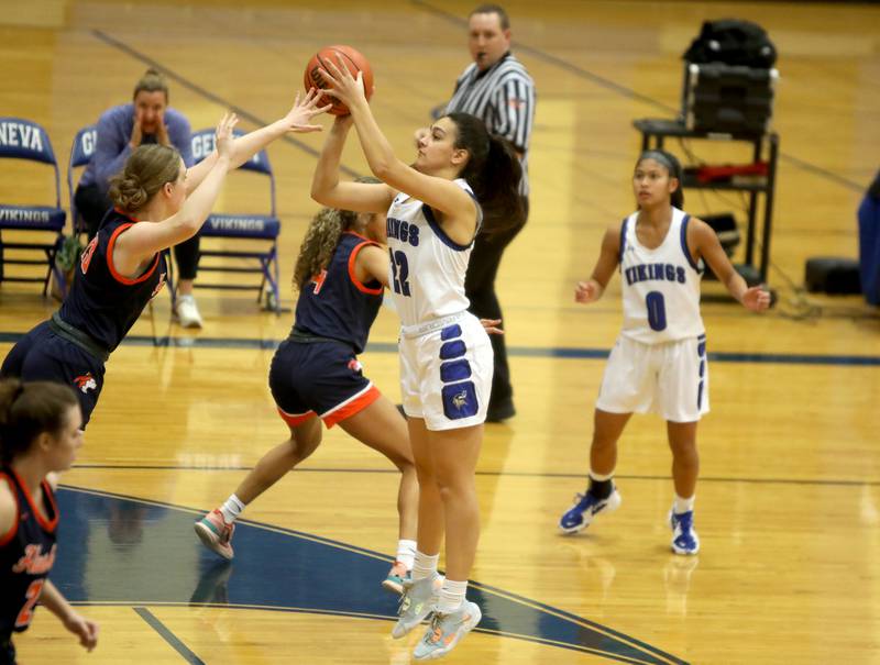 Geneva’s Leah Palmer (22) shoots the ball during a home game against Naperville North on Tuesday, Nov. 29, 2022.