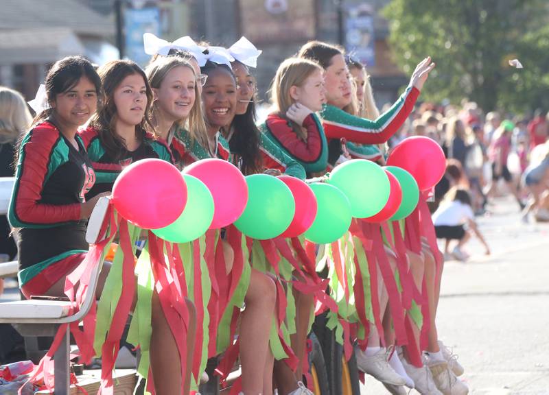 L-P cheerleaders ride in the Homecoming parade on Thursday, Oct. 5, 2023 downtown Peru.