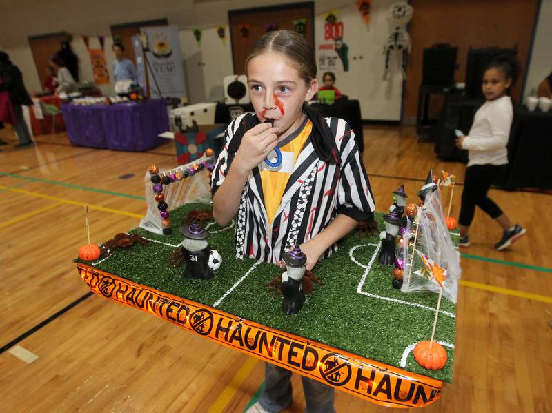 Aubrey Carey, 10, of Round Lake blows her whistle dressed as a haunted soccer field during Witchy Thrills & Chills at the Lindenhurst Park District Lippert Community Center on October 14th in Lindenhurst.
Photo by Candace H. Johnson for Shaw Local News Network