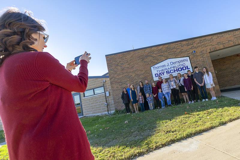 The family of Thomas J. Dempsey have their photo taken in front of the Dixon School District’s new Therapeutic Day School named after Dempsey. The school was officially dedicated with an open house on Saturday, Oct. 19, 2024.