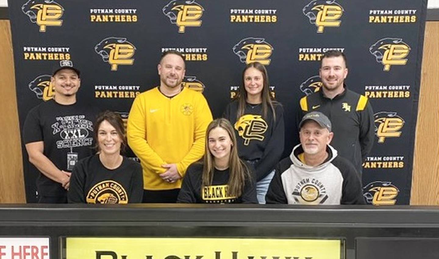 Putnam County senior Ava Hatton (front center) signed to play basketball for Black Hawk College. She was joined by her parents (front) row) Niki and Chuck Hatton; and (back row) Robbie Ramirez (trainer from Xercise Science), Jared Sale (PC coach, her sister, Presley, and Logan Frye (Black Hawk coach).