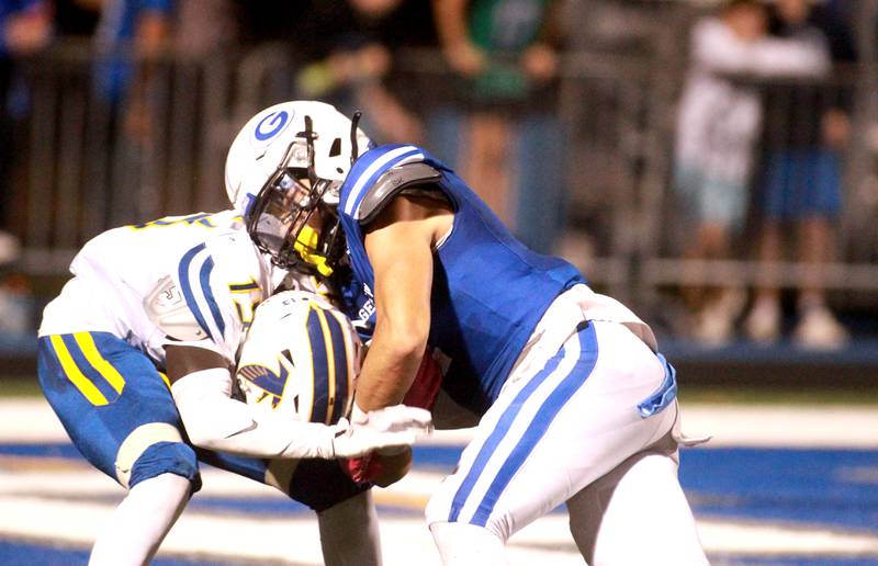 Geneva’s Troy Velez runs the ball in for a touchdown during a game against Wheaton North on Friday, Oct. 11, 2024 at Geneva.