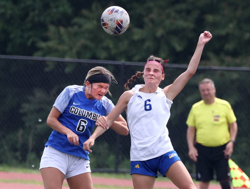 Johnsburg's Liz Smith (right) and Columbia's Sadie Metz go for a header Saturday, June 7, 2025, during the IHSA Class 1A state championship game at North Central College in Naperville.