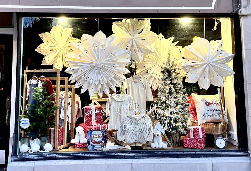 Large snowflakes are on display in the window at Sweet Jane, a Downers Grove boutique participating in the Holiday Window Contest sponsored by the Downtown Downers Grove Management Corporation.