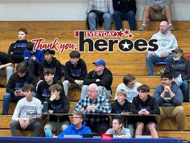 Longtime ‘Blue Streak’ and voice of Woodstock basketball is beloved by high school students, staff