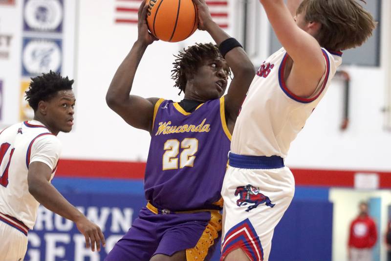 Wauconda’s Khalil Roberson looks for an option in varsity basketball Friday, Dec. 20, 2024 at Dundee-Crown High School in Carpentersville.