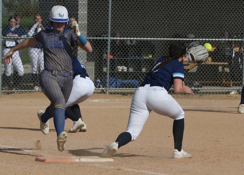 Princeton's Keely Lawson is called safe at first base as Bureau Valley's Carly Reglin removes her foot off the bag to catch the ball on Thursday, April 25, 2024 at Bureau Valley High School.