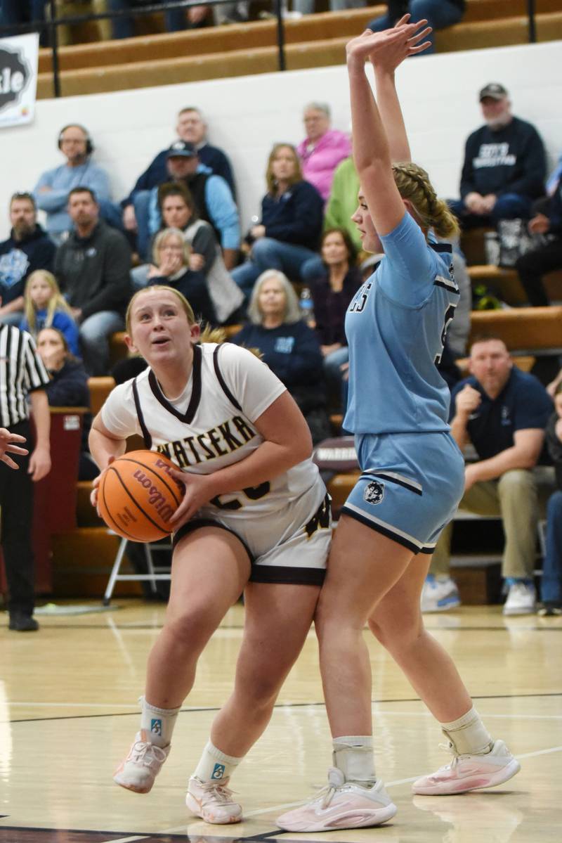 Watseka/Milford's Noelle Schroeder, left, drives past Cissna Park's Mady Marcott during a game at Watseka Monday, Feb. 9, 2026.