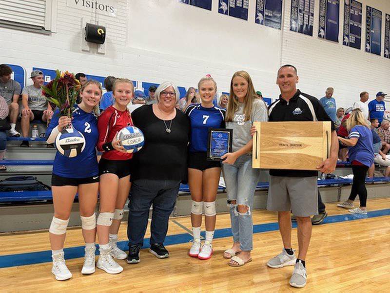 Former Newark volleyball coach Tonya Grayson (third from left), who stepped down at the end of the fall 2021 season, was honored prior to Tuesday's Newark volleyball match with Seneca.