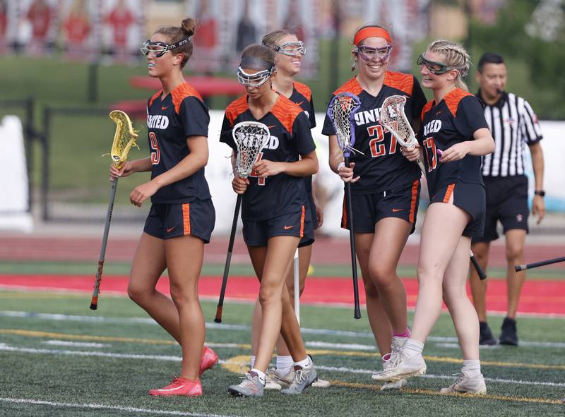 Crystal Lake Central Coop celebrate a goal by Anna Star (27) during the lacrosse state semi-final match between Crystal Lake Central and Loyola Academy on Thursday, June 5, 2025 in Hinsdale.