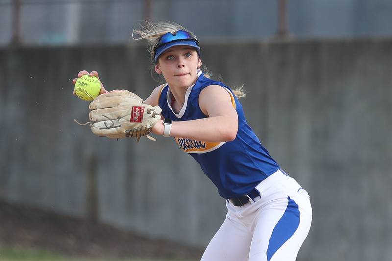 Joliet Central’s Hayden Voss looks to make a throw to first against Wilmington on Tuesday, March 12 in Joliet.