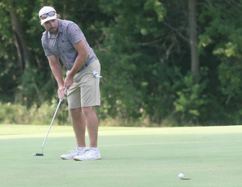 Mason Kimberly sinkes his put on the 17th hole during the Illinois Valley Mens Golf Championship Tournament on Sunday, July 27, 2025 at Spring Creek Golf Course in Spring Valley.