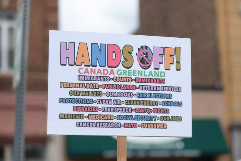 This was one of the signs displayed during the Hands Off rally held around the historic Ogle County Courthouse in Oregon on Saturday, April 5, 2025. Around 400 people took part in the afternoon event.