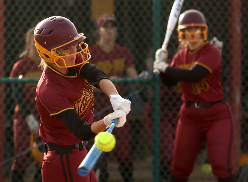 Richmond-Burton’s Mia Spohr connects during varsity softball at Marengo Wednesday evening.
