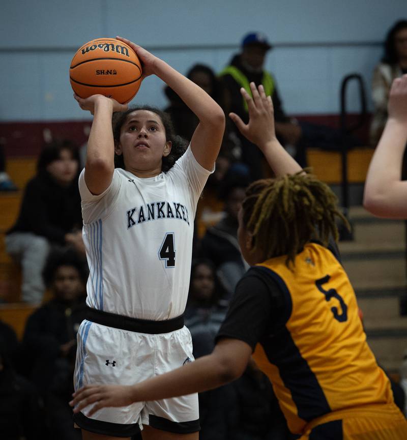 Kankakee's Malea Harrison lines up for a shot as Thornwood's Ashlee Veley, right, defends in a game on Thursday, December 11, 2025.