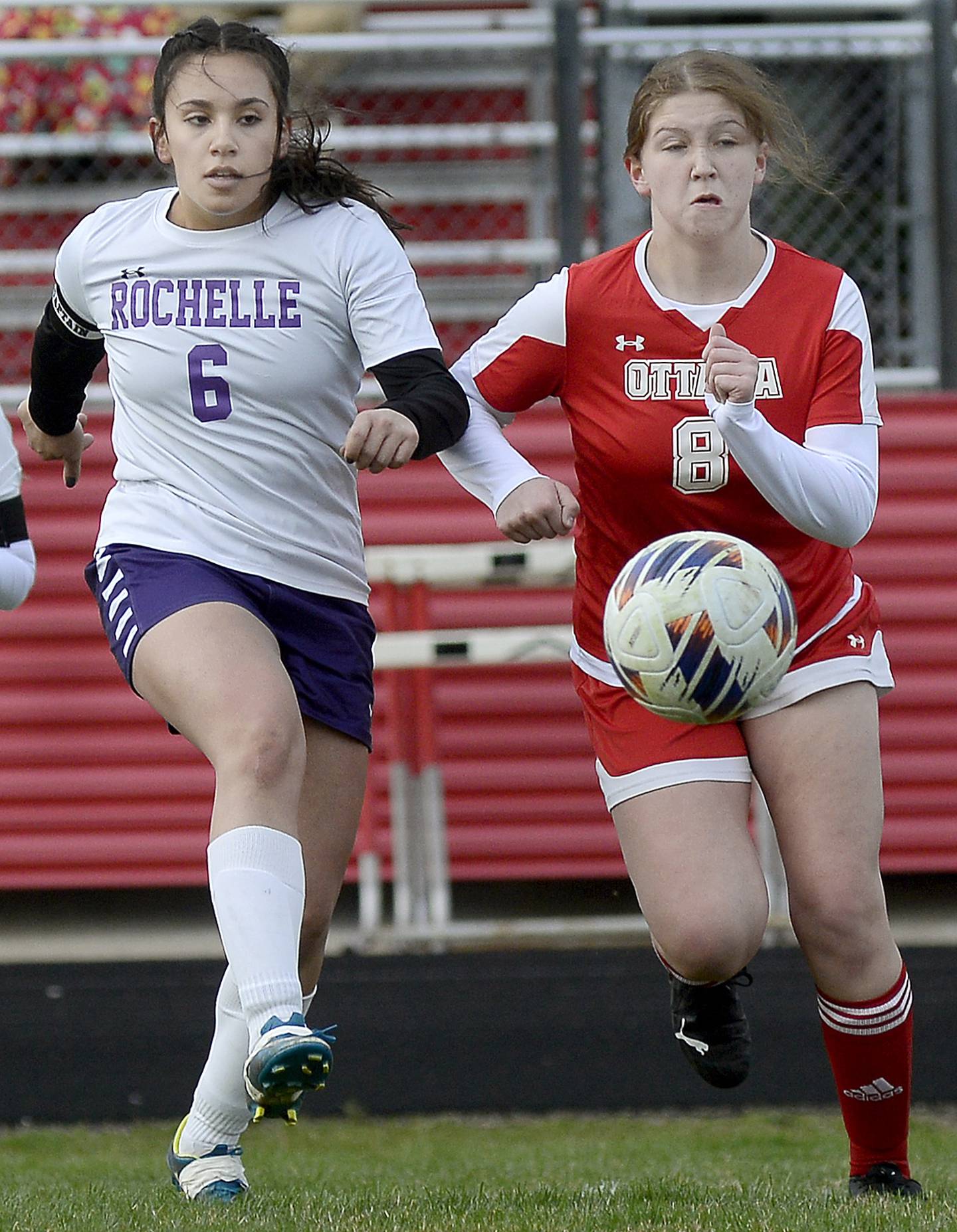 Rochelle’s Jasmine Hernandez and Ottawa’s Sophia Falaney race for control of the ball  in the first half during a match on Wednesday, April 5, 2023 at King Field in Ottawa.