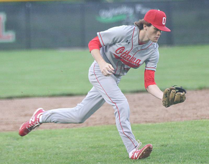 Ottawa third baseman Aiden Mucci scoops up a ground ball to throw a Rock Island player out in the Class 3A regional semifinal game on Wednesday, May 25, 2022, at Dickinson Field in Oglesby.