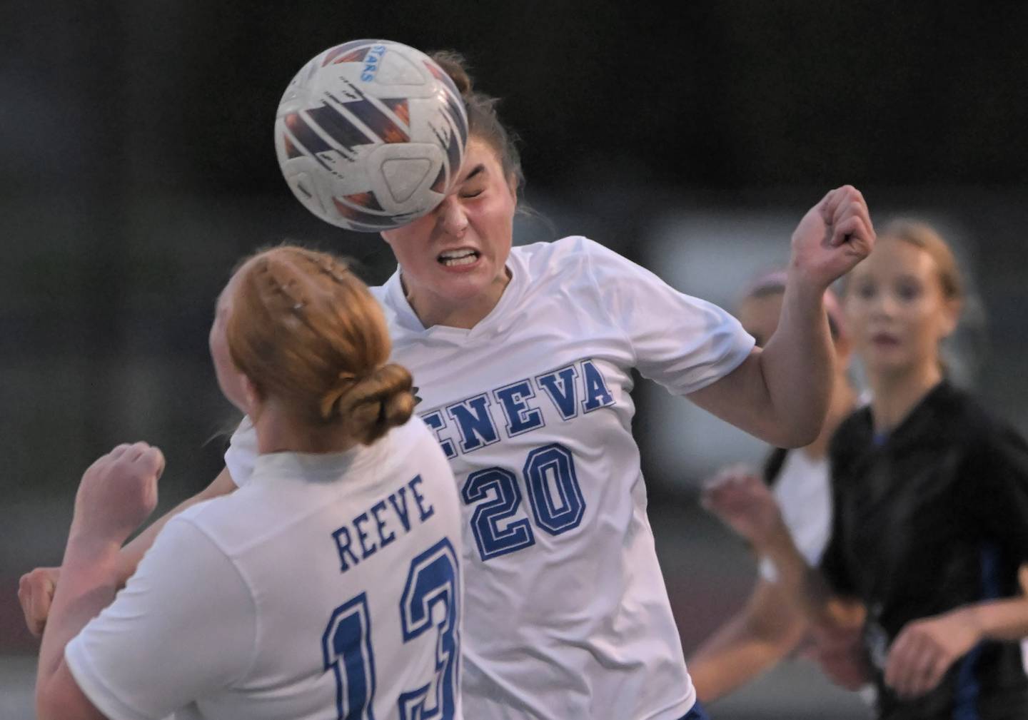 Geneva’s Tegan Modjeski heads the ball in a girls soccer game in against St. Charles North St. Charles on Thursday, Apr. 9, 2026.