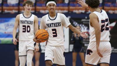 Photos: Oswego vs. Oswego East boys basketball