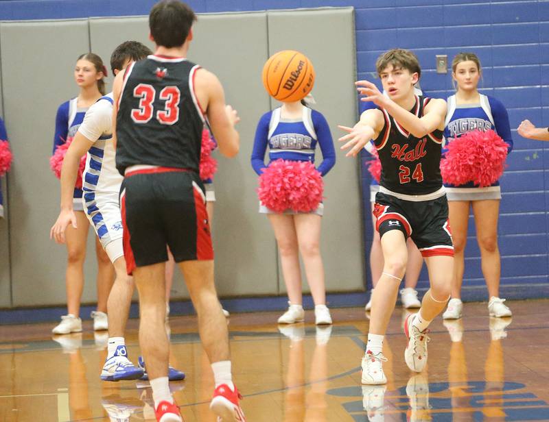 Hall's Gage Olson looks to pass the ball to teammate Braden Curran against Princeton on Friday, Feb. 13, 2026 at Princeton High School.