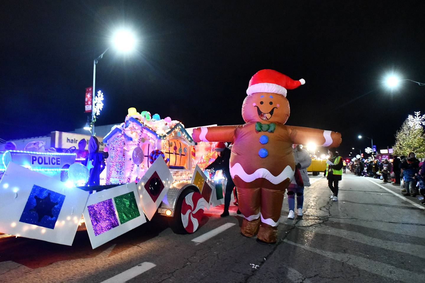 A giant gingerbread man walk in the 37th annual Bradley Christmas Parade as dozens of entries decorated to the theme of a "Candy Land Christmas" traveled along Broadway Street in 2022.