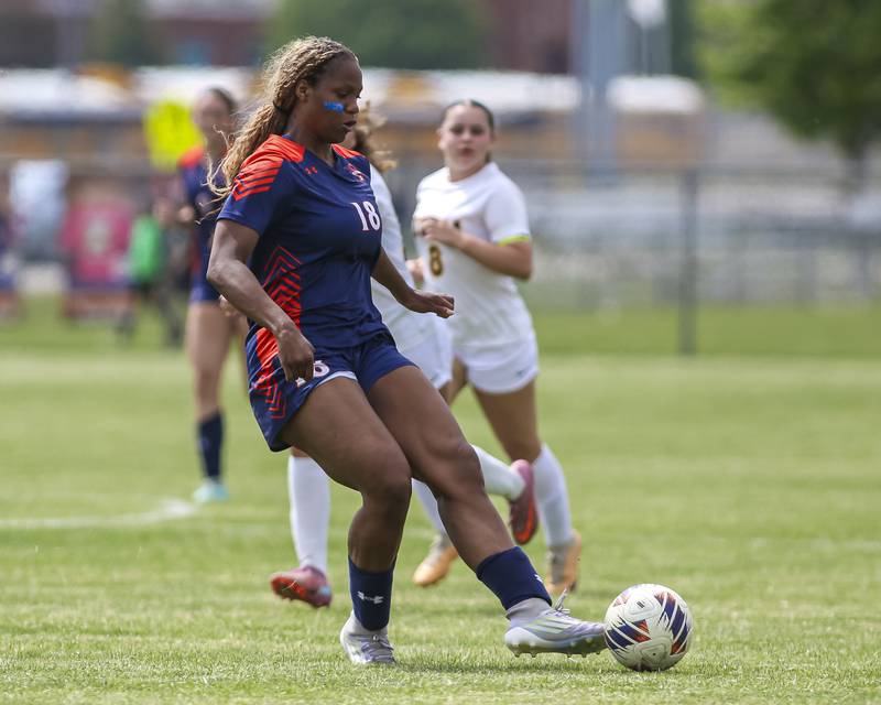 Oswego's Jordyn Washington (18) passes the ball during Class 3A regional final soccer match between Neuqua Valley at Oswego on Saturday, May 23, 2026 in Oswego.