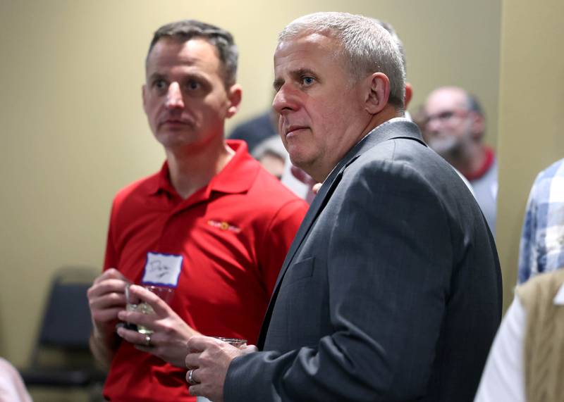 DeKalb Mayor Cohen Barnes, who is running for reelection, watches the screen as the first numbers are posted Tuesday, April 1, 2025, during his election night party at Faranda's Banquets in DeKalb.