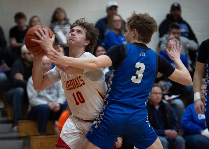 St. Anne's Grant Pomaranski looks to take a shot as Clifton Central's Andrew Rohlwing guards in the RVC Tournament Championship on Friday, Feb. 13, 2026.