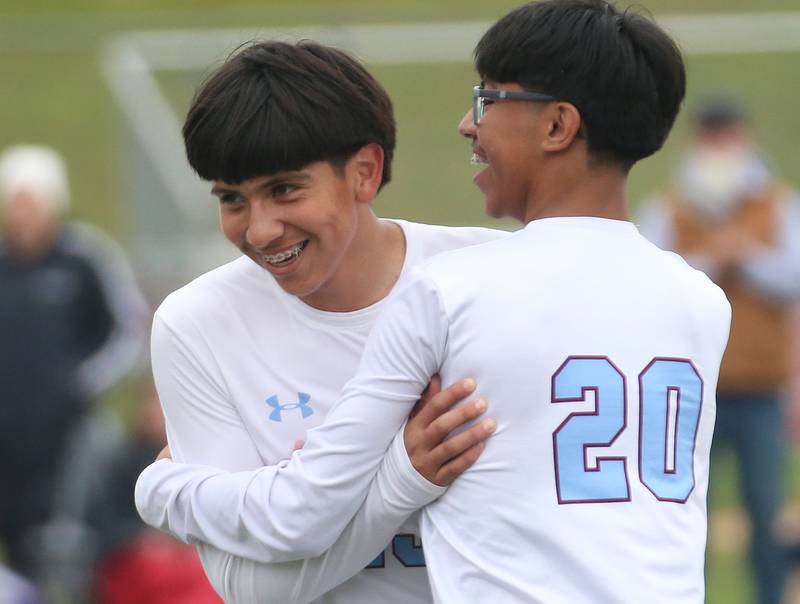Kankakee's Luisangel Pereda reacts with teammate Ulysses Serna after defeating L-P during the Class 2A Regional title game on Saturday, Oct. 25, 2025 at Ottawa High School.
