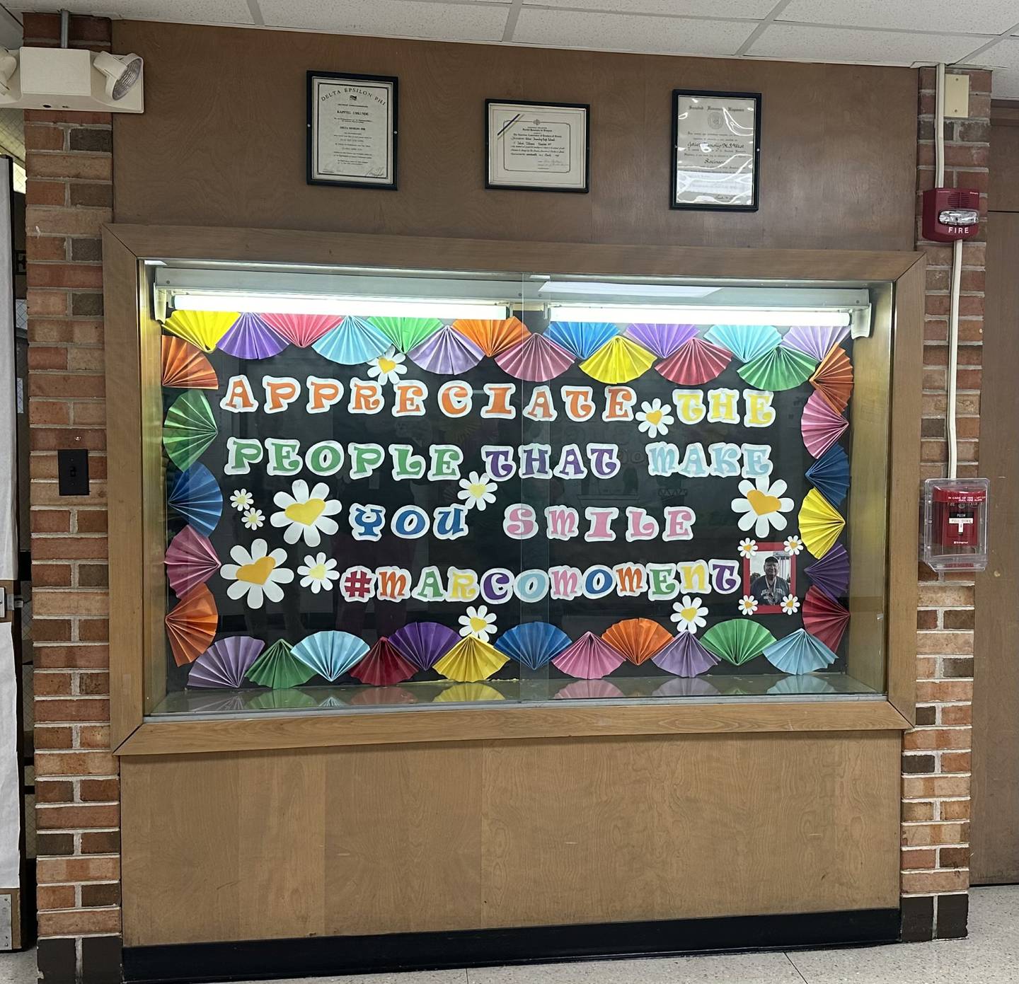 Students and staff at Joliet West High School decorated this bulletin board at the school in memory of longtime paraprofessional Dave Marco, who died March 6 in his 17th years of service to the school.