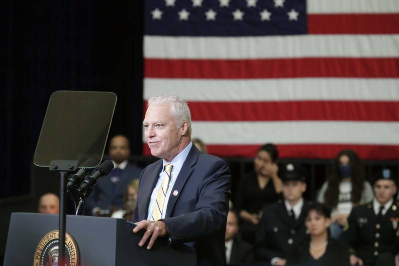 Clint Gabbard, president of McHenry County College, introduces President Joe Biden before he speaks Wednesday, July 7, 2021, at McHenry County College in Crystal Lake.