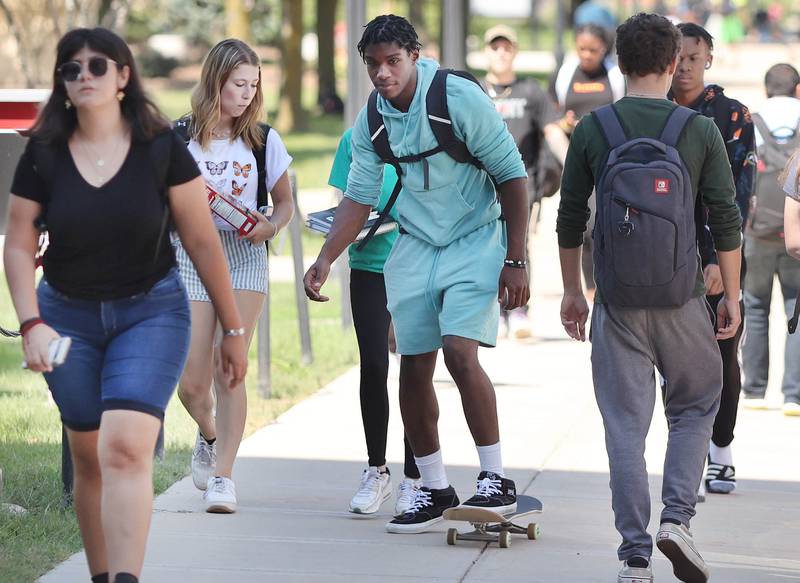 Northern Illinois University students move between classes Wednesday, Aug. 24, 2022, on campus at NIU in DeKalb.